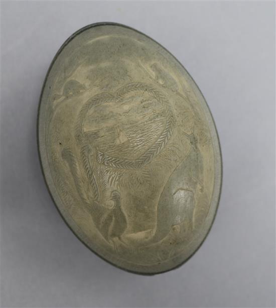An emu egg decorated with kangaroo, emu and koala